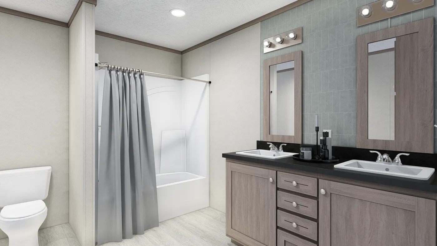 The 5624-E734P THE PULSE Primary Bathroom. This Manufactured Mobile Home features 3 bedrooms and 2 baths.
