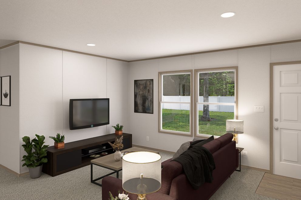 The THE EAGLE 48 Living Room. This Manufactured Mobile Home features 3 bedrooms and 2 baths.