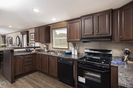 The ADIRONDACK 3628-236 Kitchen. This Manufactured Mobile Home features 2 bedrooms and 1 bath.