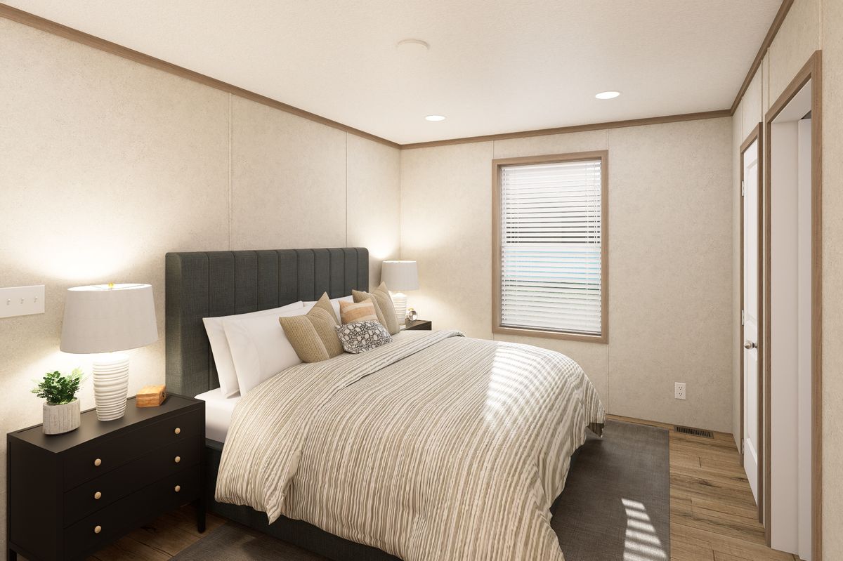 The 6616-CC03 HARBORVIEW 66 Primary Bedroom. This Manufactured Mobile Home features 3 bedrooms and 2 baths.