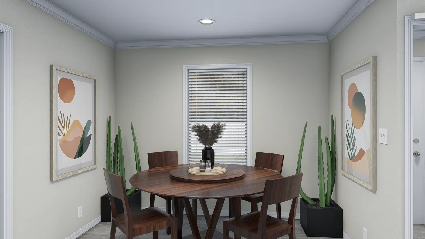 The 4207 "EMERALD" 7616 Dining Area. This Manufactured Mobile Home features 3 bedrooms and 2 baths.