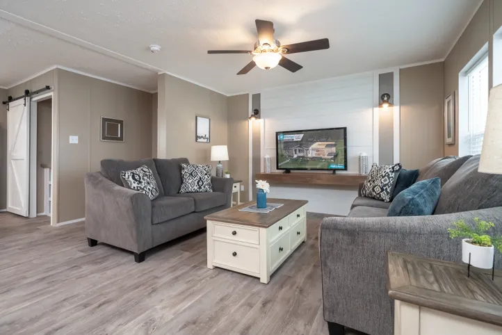 The ISLAND BREEZE Living Room. This Manufactured Mobile Home features 3 bedrooms and 2 baths.