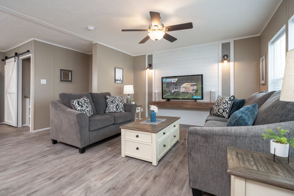 The ISLAND BREEZE Living Room. This Manufactured Mobile Home features 3 bedrooms and 2 baths.