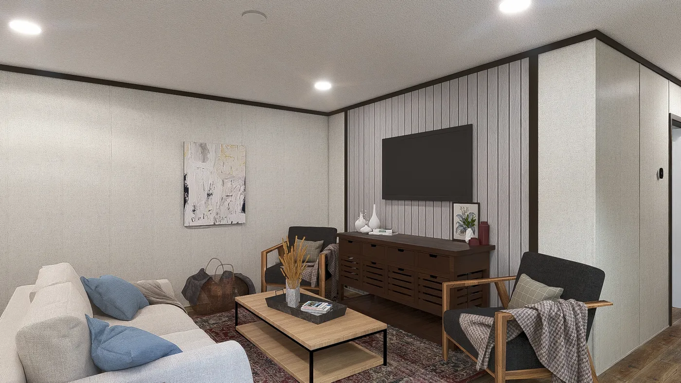 The DYNAMIC Living Room. This Manufactured Mobile Home features 3 bedrooms and 2 baths.