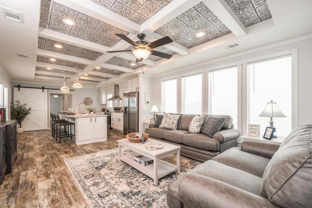 The THE DEWEY Living Room. This Manufactured Mobile Home features 3 bedrooms and 2 baths.
