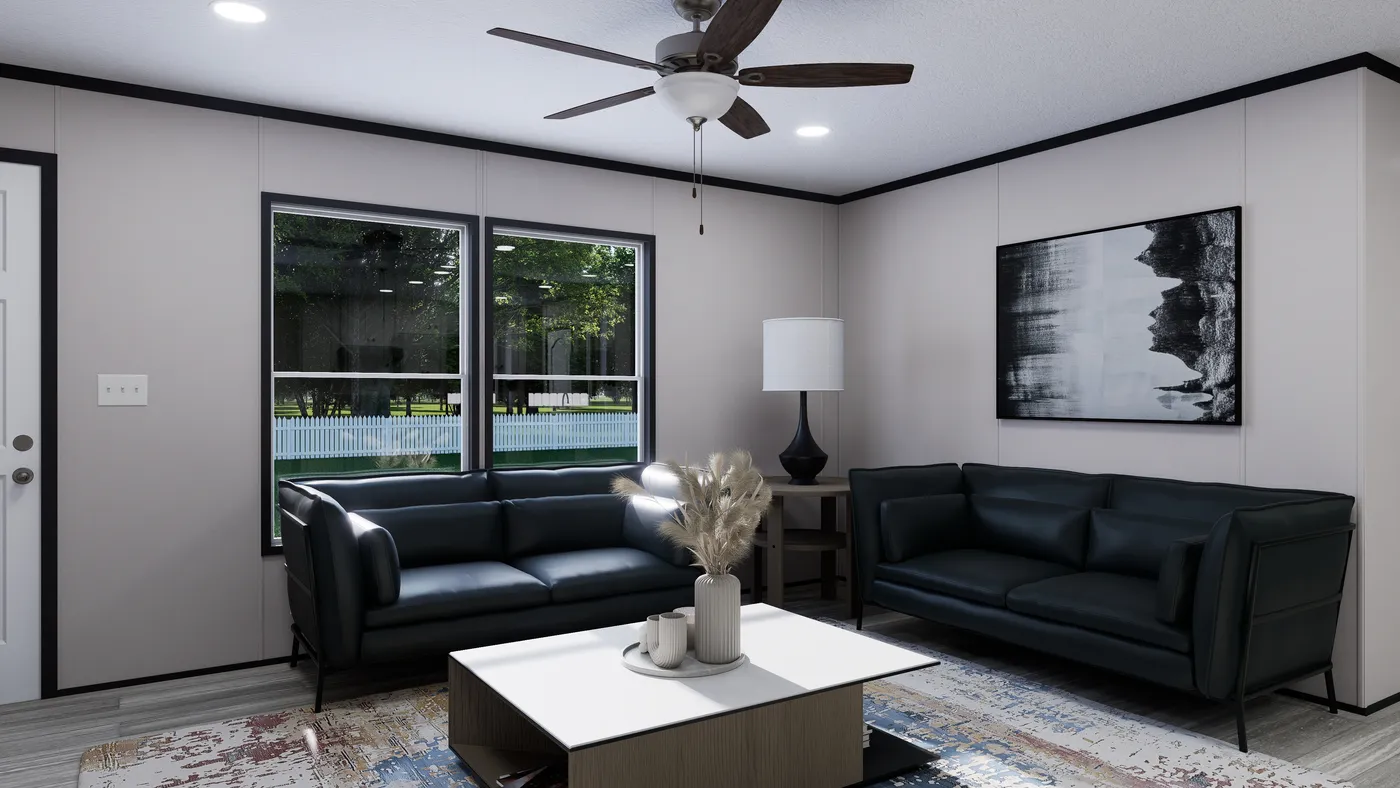 The THE MOUNTAINEER 56 Living Room. This Manufactured Mobile Home features 3 bedrooms and 2 baths.