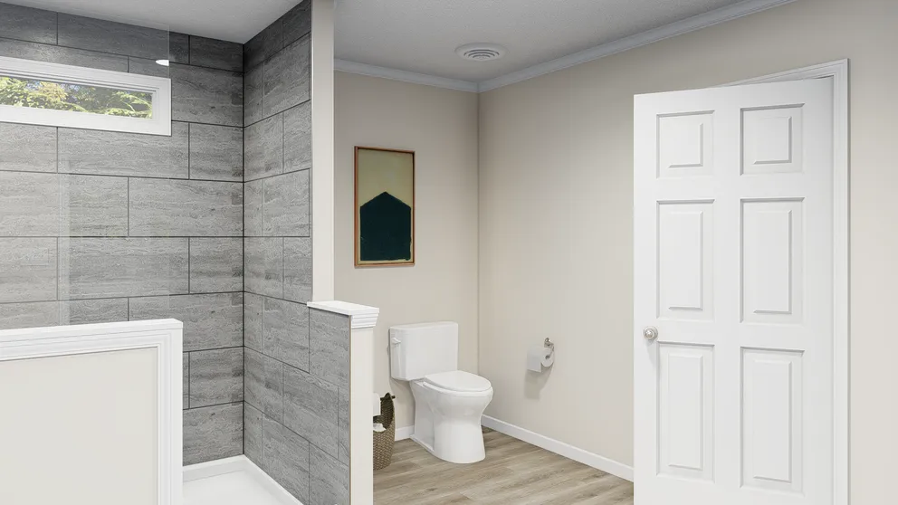 The PALMETTO 6101 Primary Bathroom. This Manufactured Mobile Home features 4 bedrooms and 2.5 baths.
