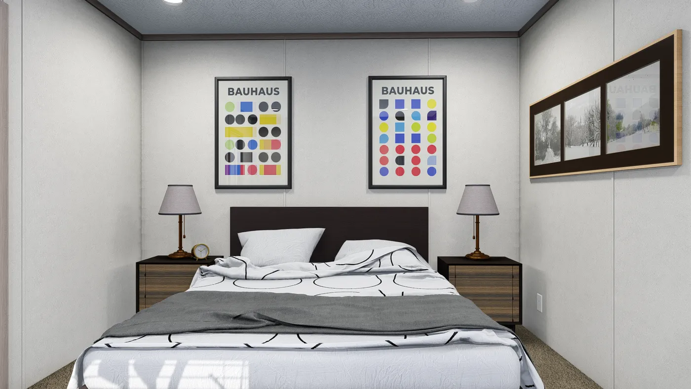 The 6014-4701 THE PULSE Primary Bedroom. This Manufactured Mobile Home features 2 bedrooms and 2 baths.