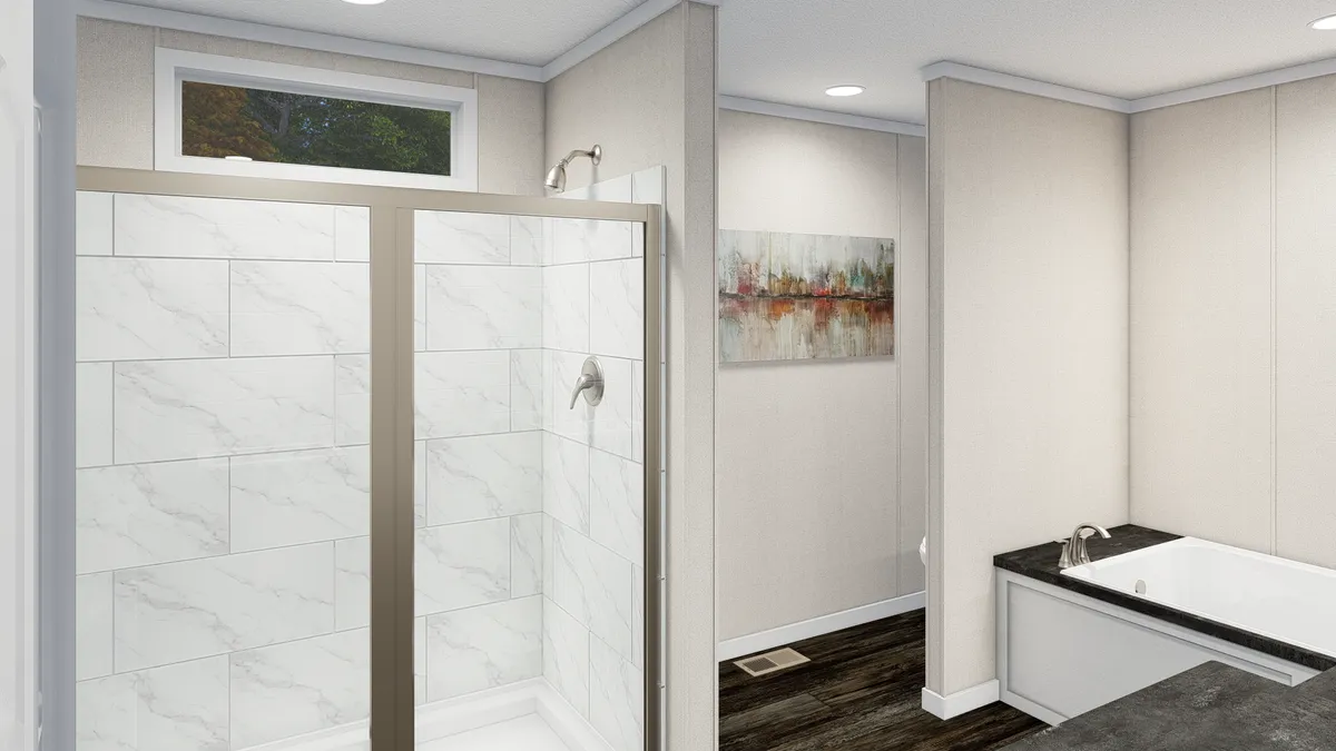 The NORTHSHORE Primary Bathroom. This Manufactured Mobile Home features 3 bedrooms and 2 baths.