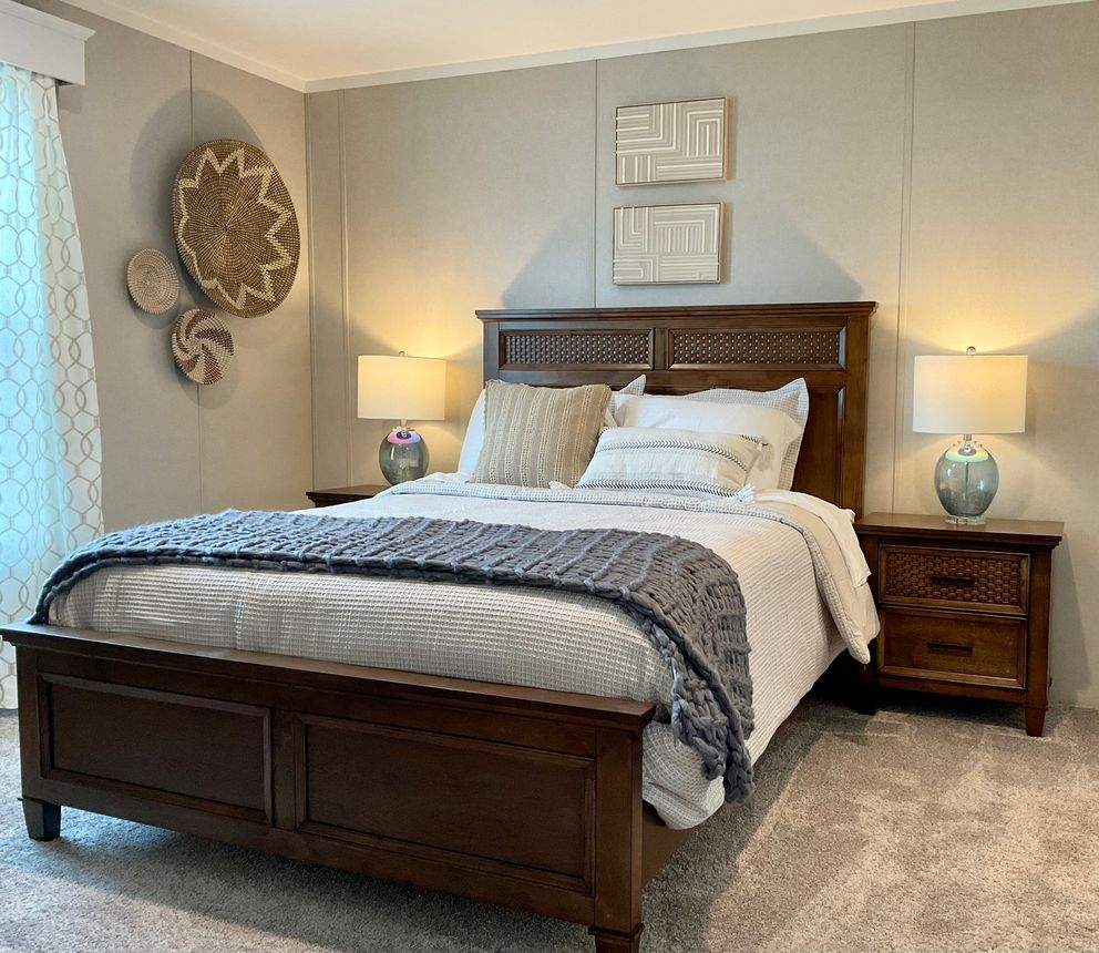 The AMETHYST Primary Bedroom. This Manufactured Mobile Home features 3 bedrooms and 2 baths.