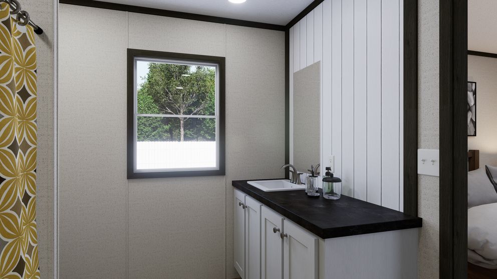 The RALLY Primary Bathroom. This Manufactured Mobile Home features 3 bedrooms and 2 baths.