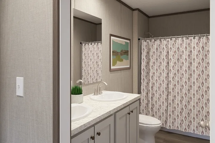 The LEGEND BIG BOY Guest Bathroom. This Manufactured Mobile Home features 4 bedrooms and 2 baths.
