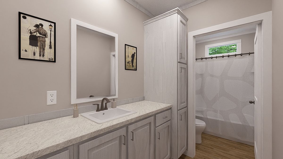 The THE HEXAGON Guest Bathroom. This Manufactured Mobile Home features 4 bedrooms and 3 baths.