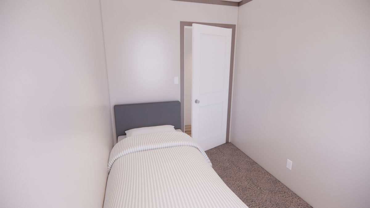 The 6616-4203 ADRENALINE Guest Bedroom. This Manufactured Mobile Home features 3 bedrooms and 2 baths.