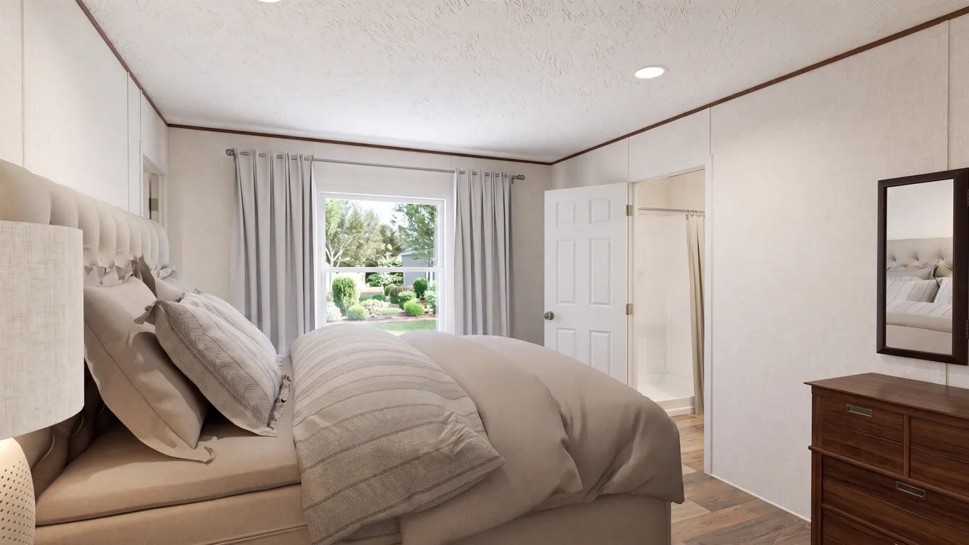 The BIRCH Primary Bedroom. This Manufactured Mobile Home features 3 bedrooms and 2 baths.