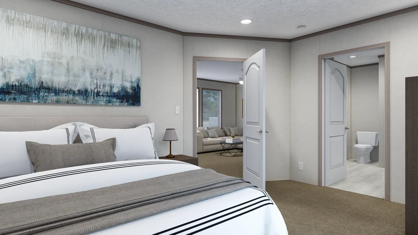 The 5624-E734P THE PULSE Primary Bedroom. This Manufactured Mobile Home features 3 bedrooms and 2 baths.