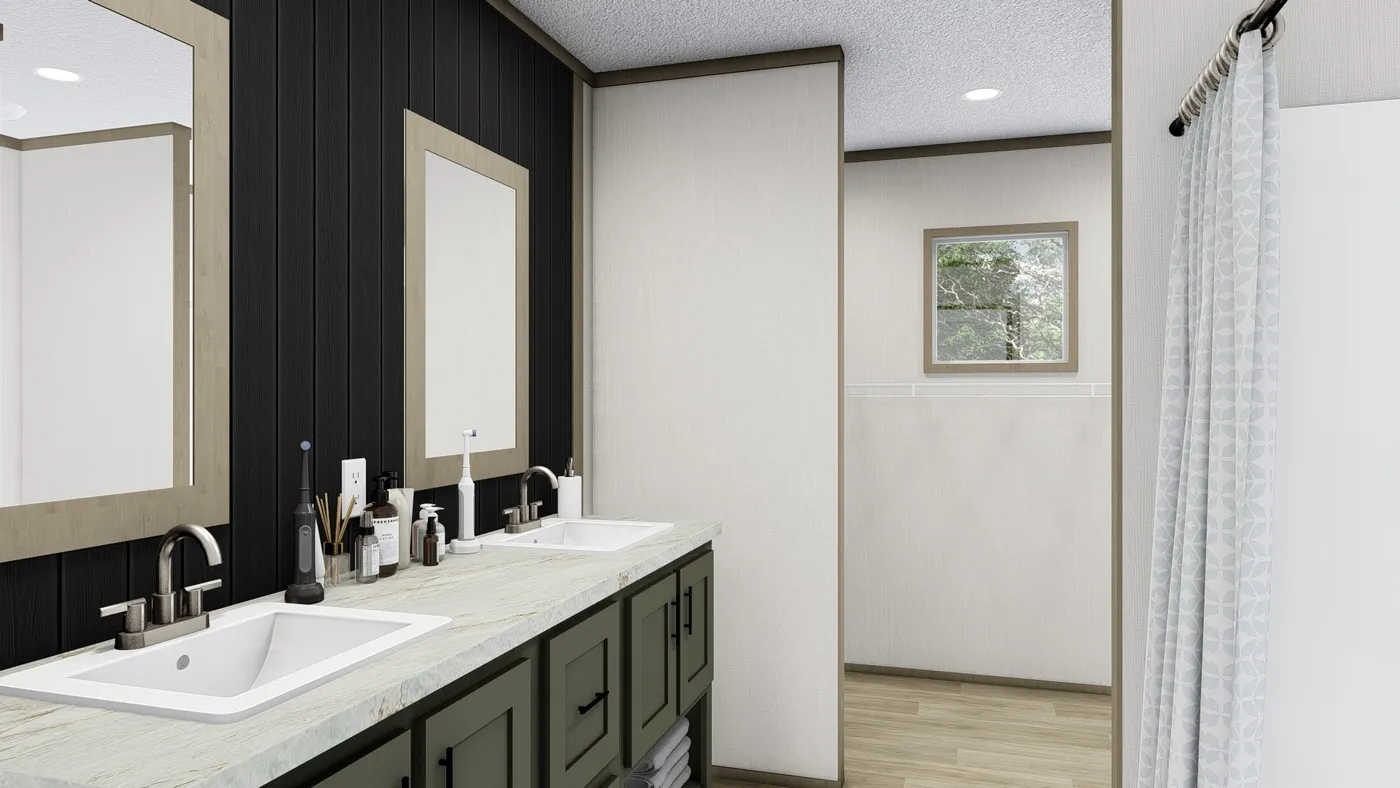 The BOONE Primary Bathroom. This Manufactured Mobile Home features 4 bedrooms and 2 baths.