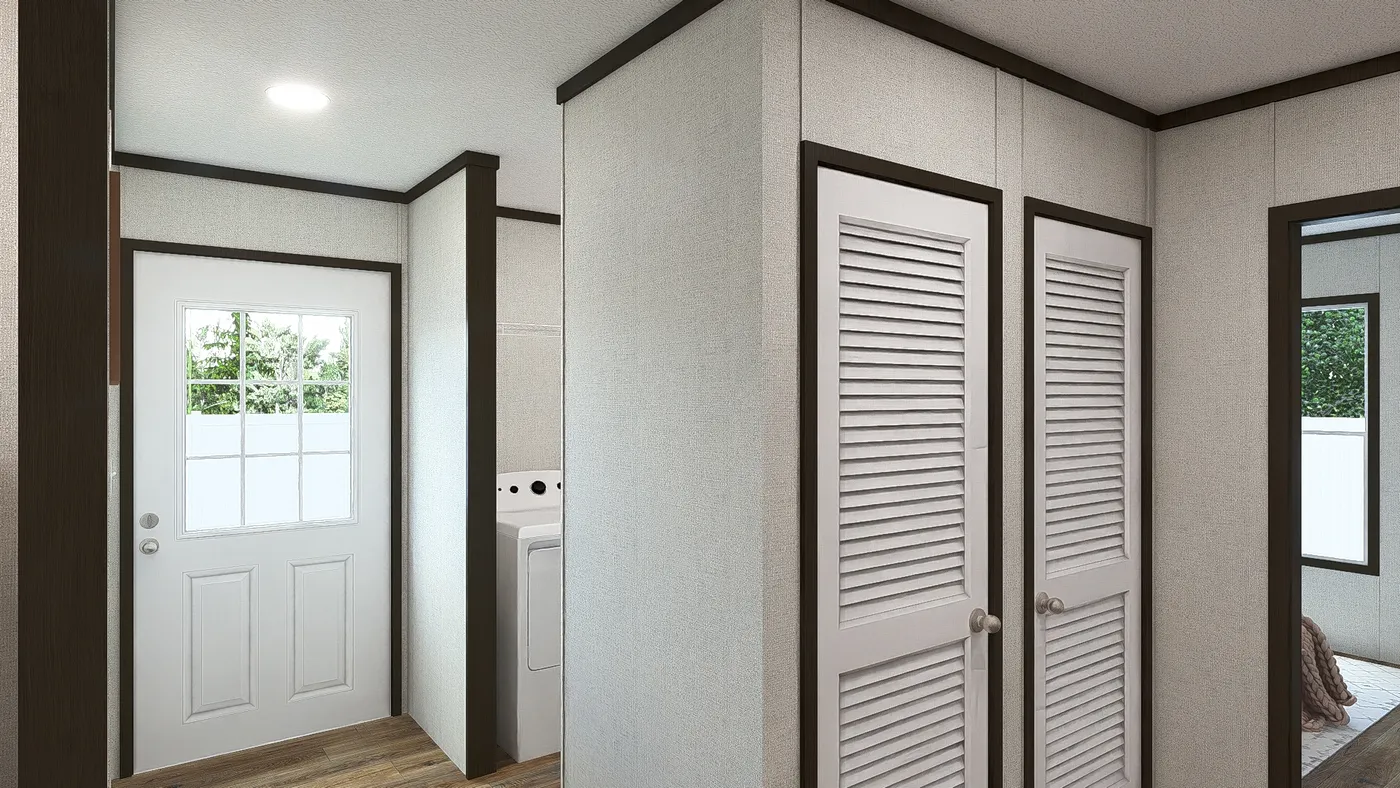 The IMPACT Utility Room. This Manufactured Mobile Home features 4 bedrooms and 2 baths.