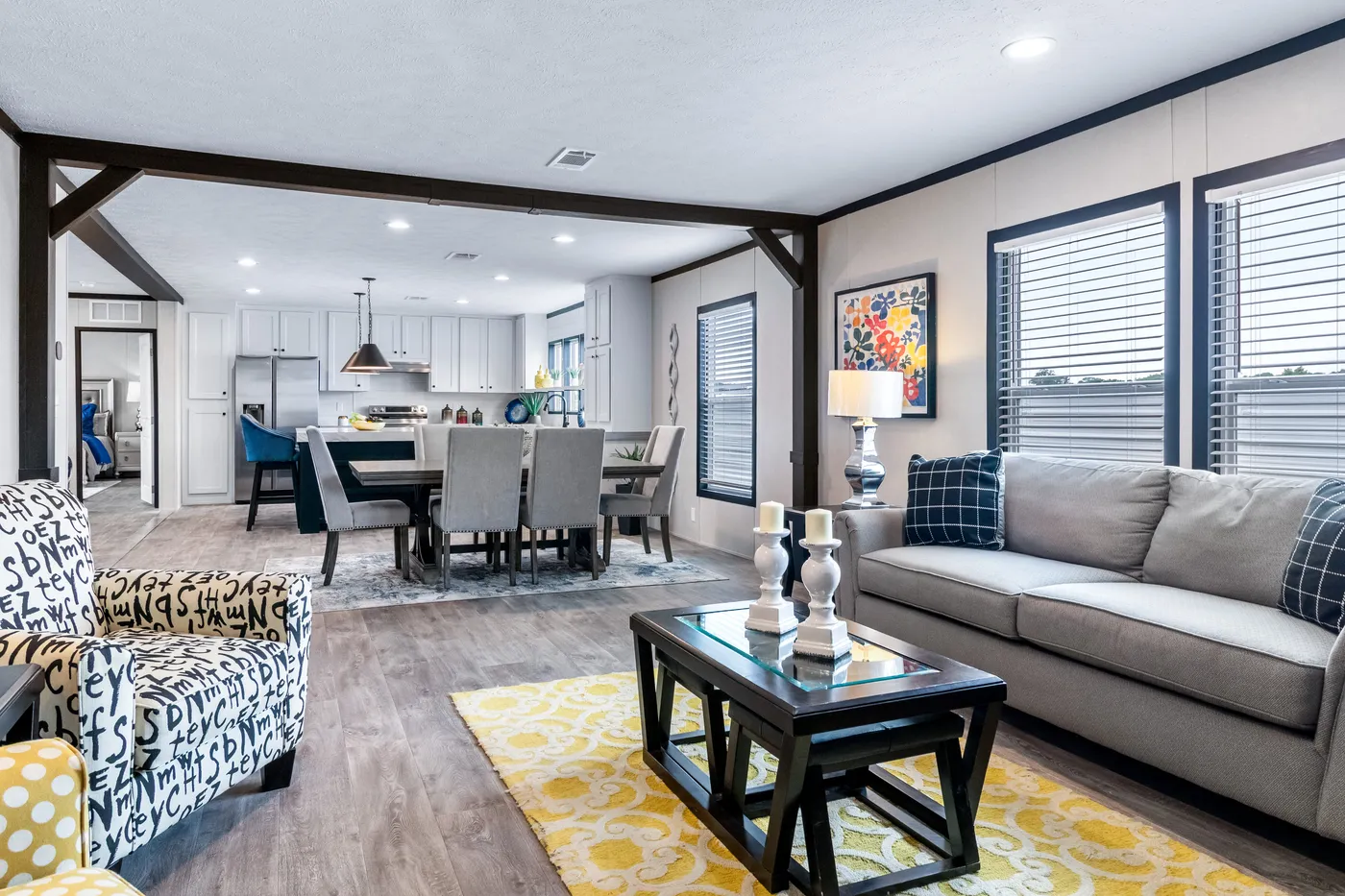 The HERCULES Den. This Manufactured Mobile Home features 4 bedrooms and 2 baths.