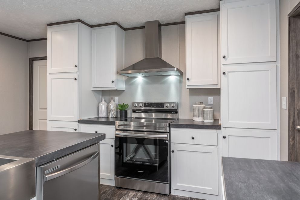 The THE GENERAL Kitchen. This Manufactured Mobile Home features 3 bedrooms and 2 baths.
