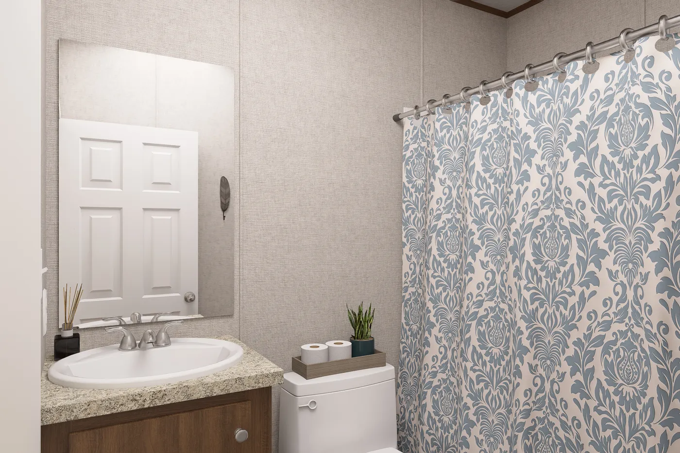 The MAGNOLIA Guest Bathroom. This Manufactured Mobile Home features 3 bedrooms and 2 baths.