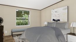 The TRIUMPH Guest Bedroom. This Manufactured Mobile Home features 5 bedrooms and 3 baths.