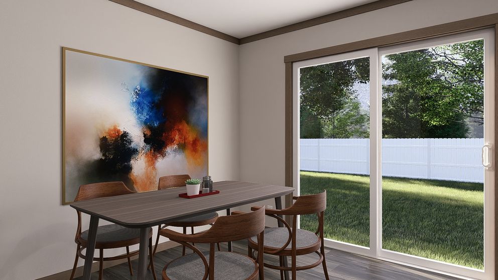 The EMILIE Dining Room. This Manufactured Mobile Home features 3 bedrooms and 2 baths.