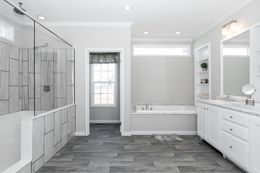 The SUPER 68 ELITE Primary Bathroom. This Manufactured Mobile Home features 3 bedrooms and 2 baths.