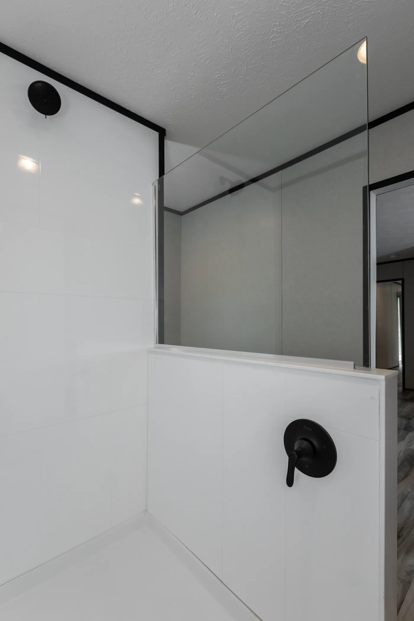 The THE SMOKEY Primary Bathroom. This Manufactured Mobile Home features 3 bedrooms and 2 baths.