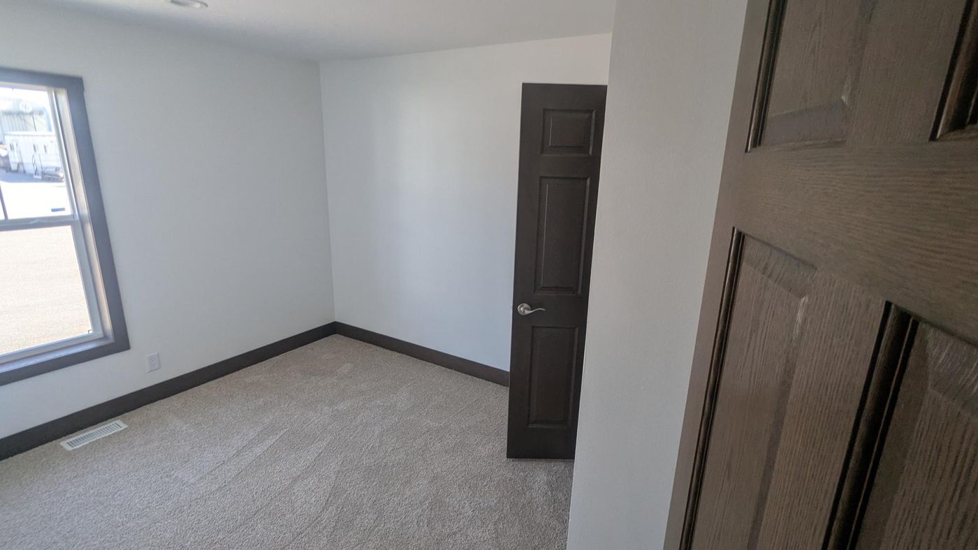 The LEGEND 78 MOD Bedroom. This Modular Home features 3 bedrooms and 2 baths.