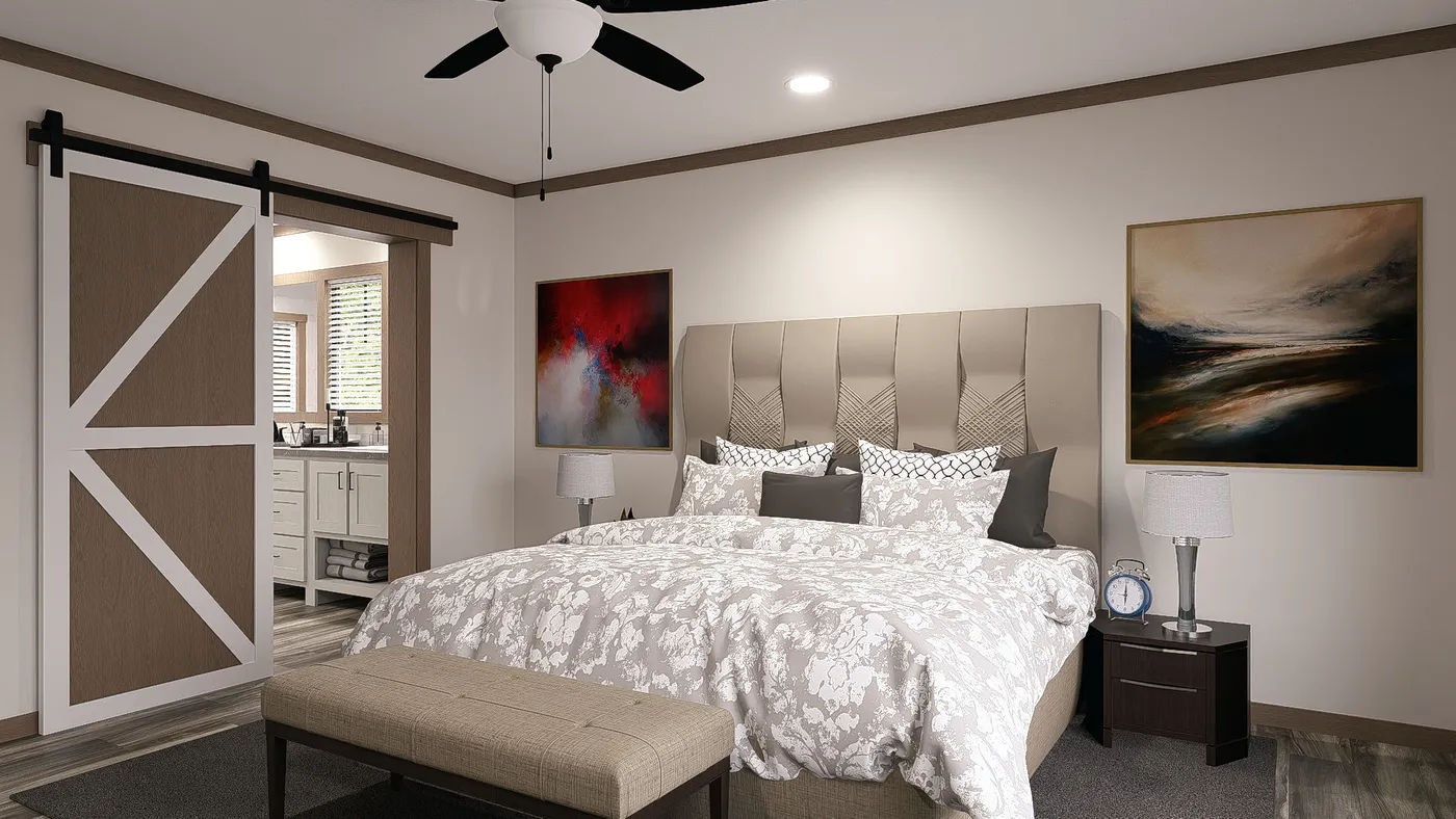 The SAWYER ELITE Primary Bedroom. This Manufactured Mobile Home features 3 bedrooms and 2 baths.