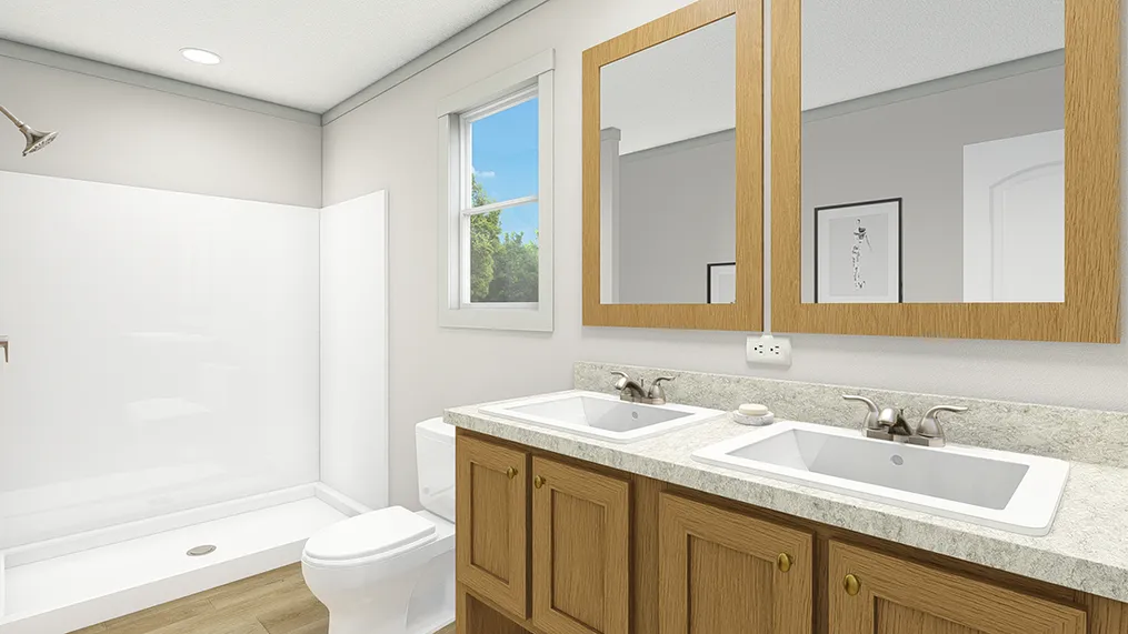 The UNDER PRESSURE Primary Bathroom. This Manufactured Mobile Home features 3 bedrooms and 2 baths.