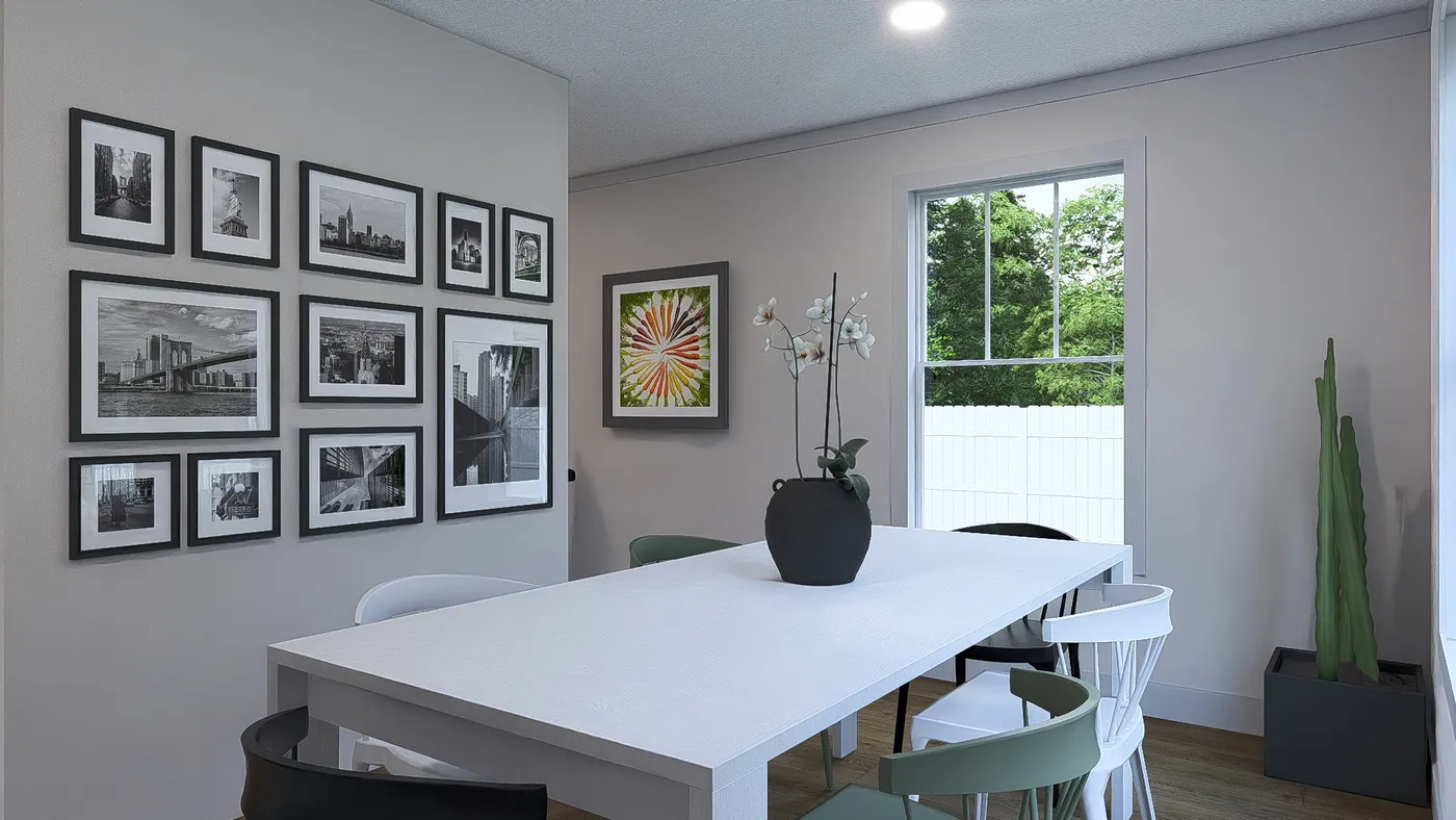 The STAYIN' ALIVE Dining Area. This Manufactured Mobile Home features 3 bedrooms and 2 baths.