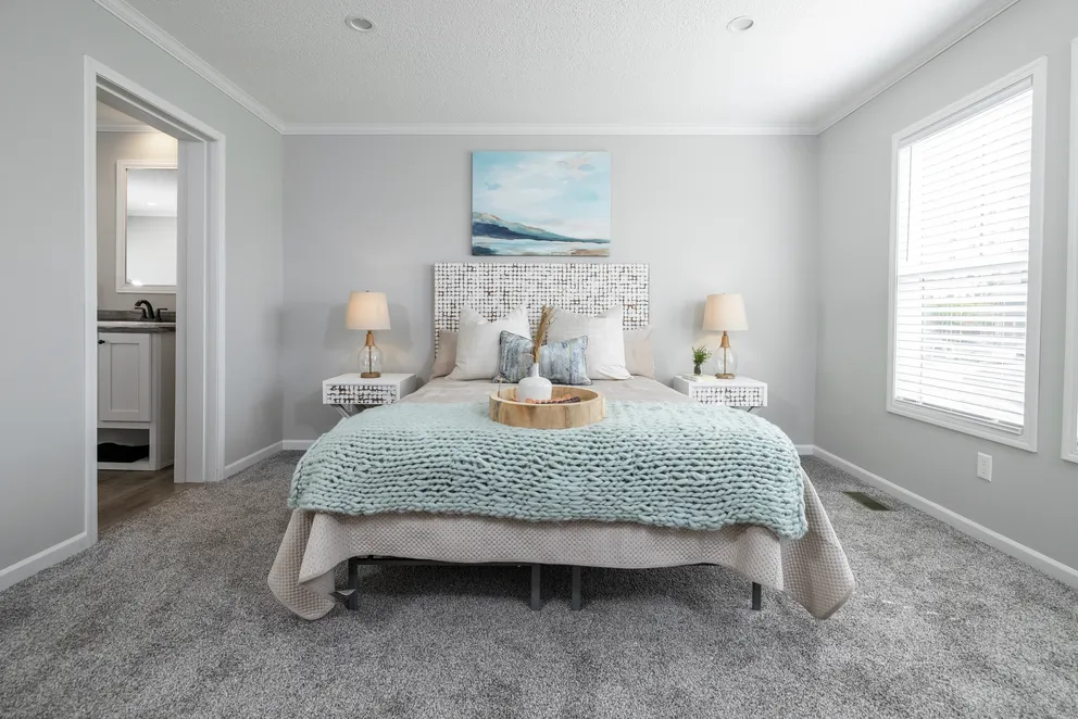 The THE JEFFERSON Primary Bedroom. This Manufactured Mobile Home features 3 bedrooms and 2 baths.