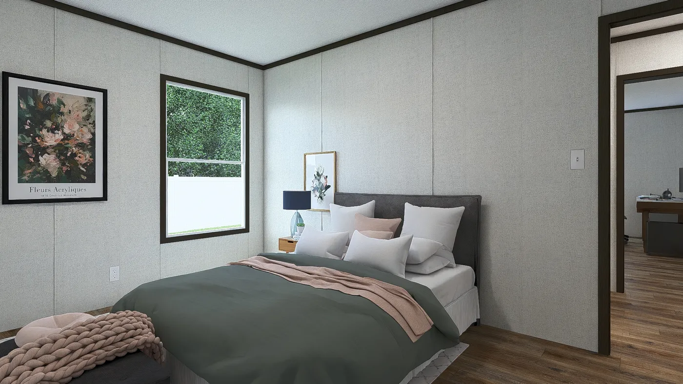 The DISCOVER Guest Bedroom. This Manufactured Mobile Home features 3 bedrooms and 2 baths.