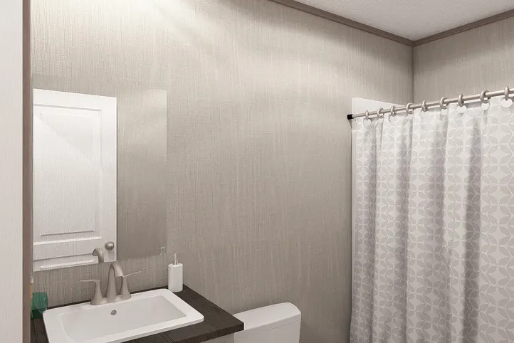 The ULTRA A-PLUS 16X76 Guest Bathroom. This Manufactured Mobile Home features 3 bedrooms and 2 baths.