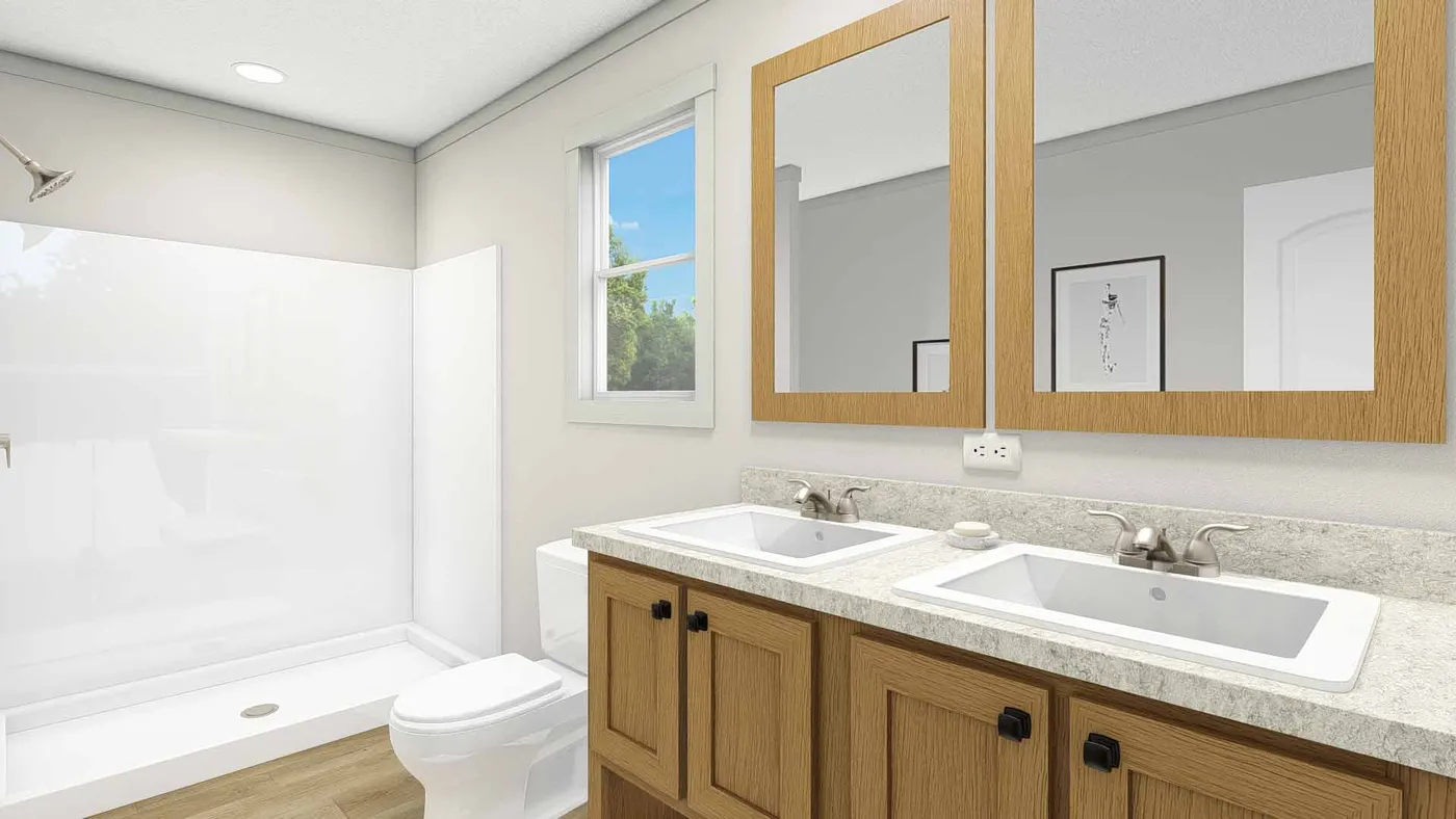 The UNDER PRESSURE Primary Bathroom. This Manufactured Mobile Home features 3 bedrooms and 2 baths.