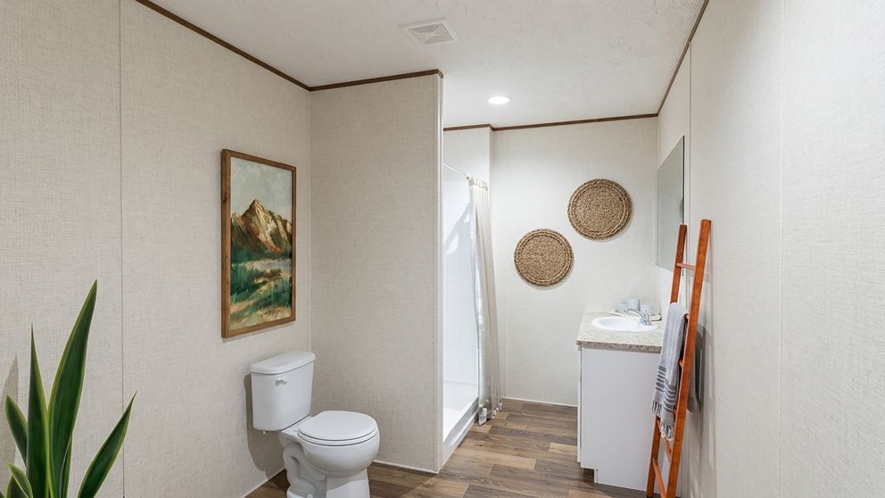 The MAPLE Primary Bathroom. This Manufactured Mobile Home features 3 bedrooms and 2 baths.