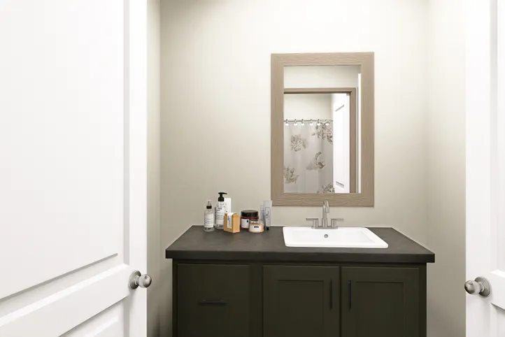 The SUMMIT Guest Bathroom. This Manufactured Mobile Home features 4 bedrooms and 3 baths.