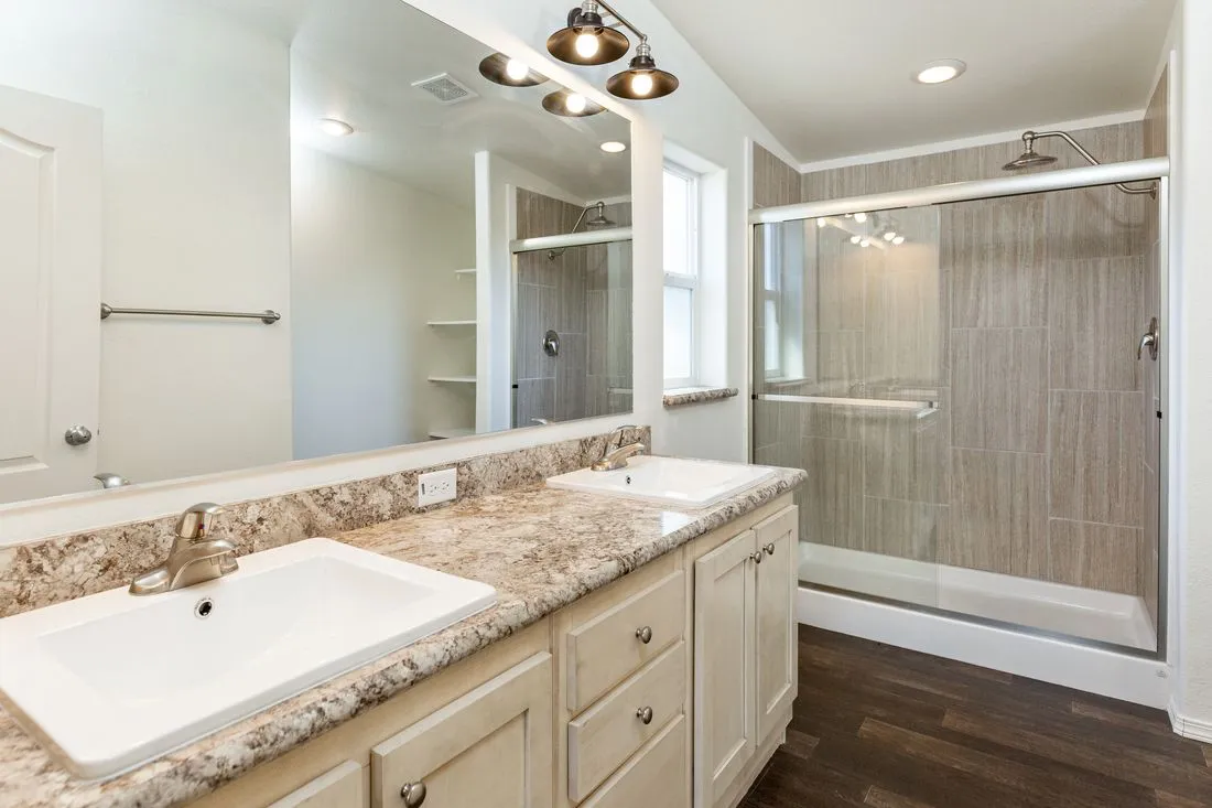 The 2017 COLUMBIA RIVER (NEW) Primary Bathroom. This Manufactured Mobile Home features 3 bedrooms and 2 baths.