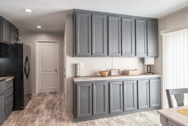 The ANNIVERSARY CHOICE Kitchen. This Manufactured Mobile Home features 3 bedrooms and 2 baths.