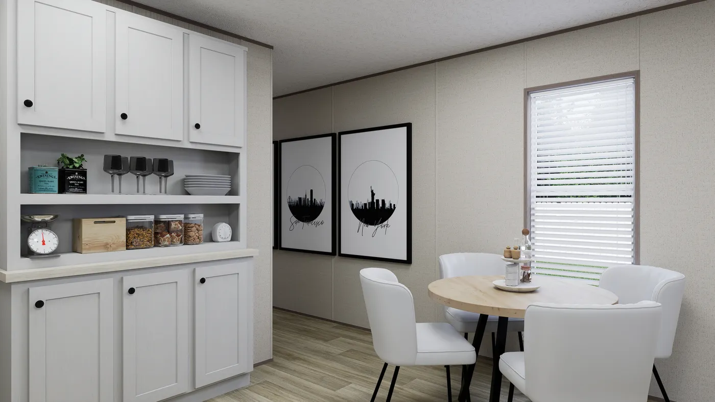 The GLACIER VISTA Dining Area. This Manufactured Mobile Home features 4 bedrooms and 2 baths.