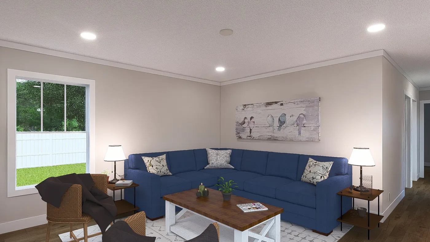 The MOVE ON UP Living Room. This Manufactured Mobile Home features 3 bedrooms and 2 baths.