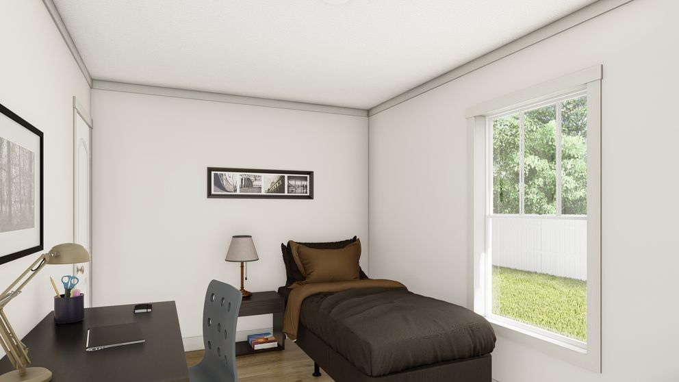 The SWEET CAROLINE Bedroom. This Manufactured Mobile Home features 3 bedrooms and 2 baths.