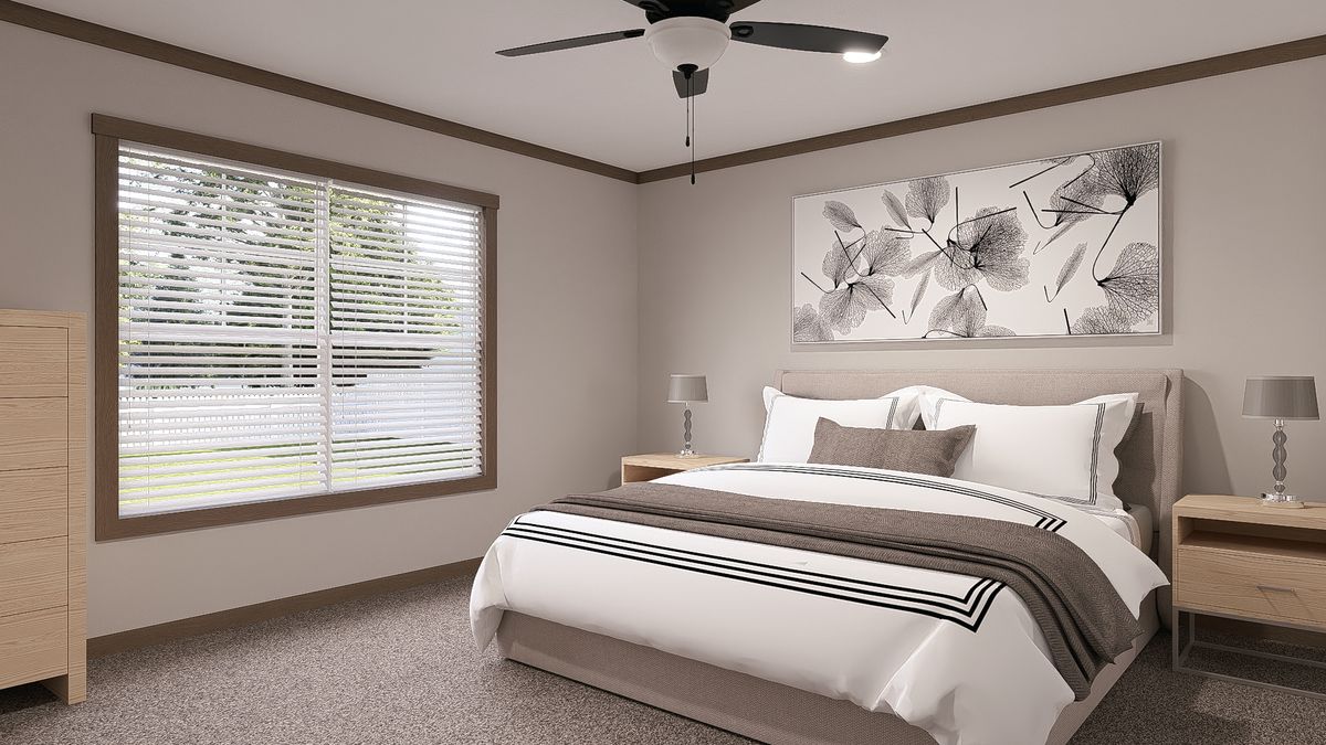 The EVERETT ELITE Primary Bedroom. This Manufactured Mobile Home features 4 bedrooms and 3 baths.