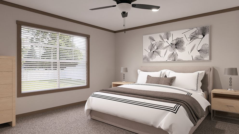 The EVERETT ELITE Primary Bedroom. This Manufactured Mobile Home features 4 bedrooms and 3 baths.