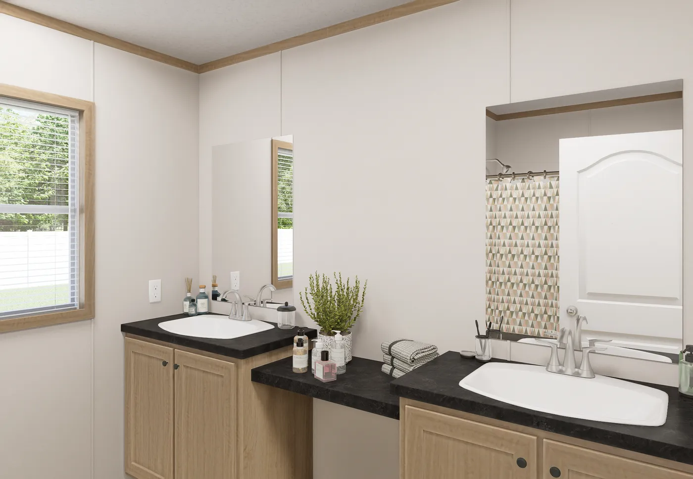 The THE MOUNTAINEER 72 Guest Bathroom. This Manufactured Mobile Home features 3 bedrooms and 2 baths.