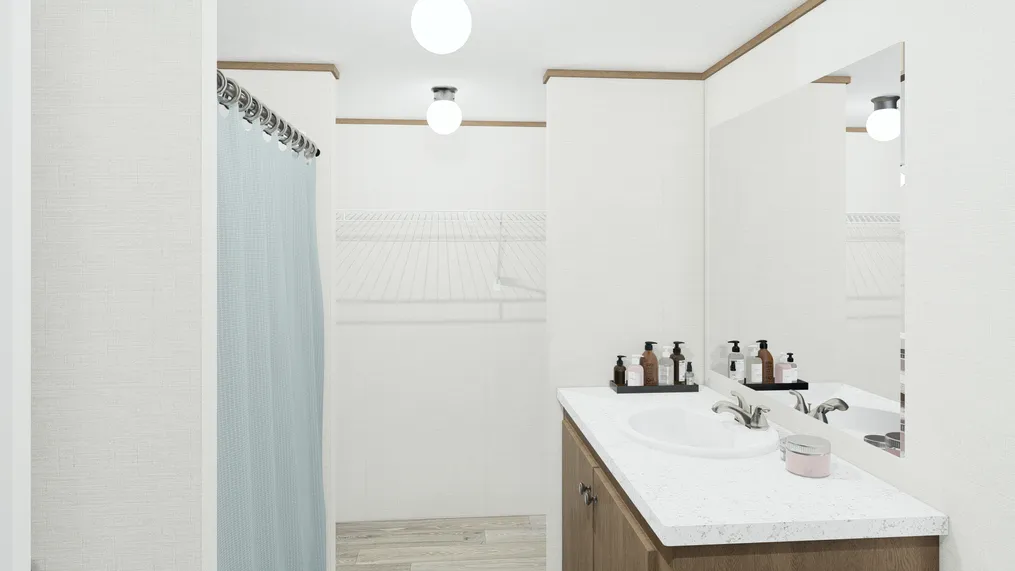 The SPECTACULAR Master Bathroom. This Manufactured Mobile Home features 3 bedrooms and 2 baths.
