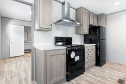 The BREEZE 16602A Kitchen. This Manufactured Mobile Home features 2 bedrooms and 2 baths.