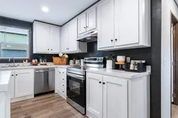 The SELECT 16723I Kitchen. This Manufactured Mobile Home features 3 bedrooms and 2 baths.